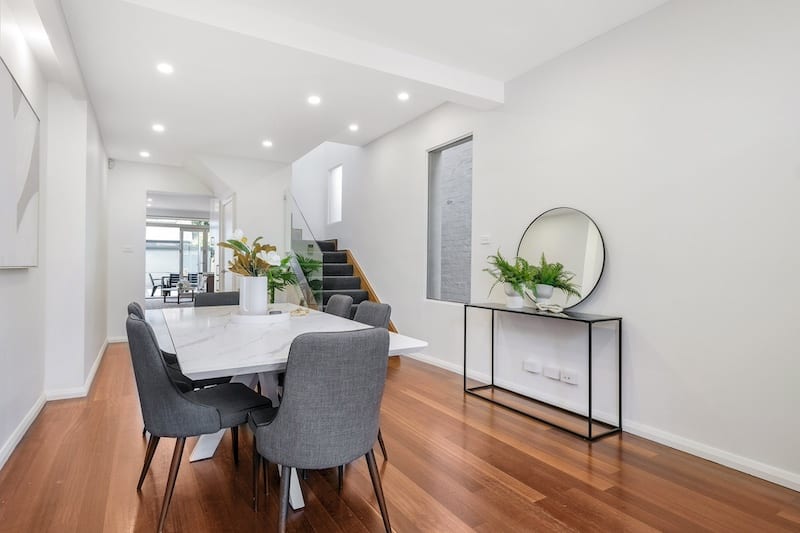 Experience a stunning transformation with our elegant dining room renovation, part of Dura Group's exceptional home improvement services. Located in Sydney, our family-owned company excels in creating beautiful, functional spaces with a homeowner-first approach. Our skilled team integrates modern design elements with a focus on time efficiency and budget-conscious planning. Specializing in home renovations across Sutherland Shire, Bayside, Inner West, Georges River, and Randwick, we ensure every project reflects quality craftsmanship and tailored building solutions. Picture your perfect dining area, complete with sleek, contemporary furniture and ambient lighting, all brought to life without compromising on your budget or timeline. Trust and transparency are at the core of Dura Group's values, ensuring you are always informed and engaged throughout the renovation process. Whether you’re looking for ground floor extensions or upper storey additions, our expertise spans kitchen upgrades to bathroom remodels. Contact Dura Group today to discuss your next project and turn your unique vision into reality. Let us transform your home elegantly and efficiently, delivering stunning results every time. Discover the Dura difference. Call us now to get started on your dream home renovation!