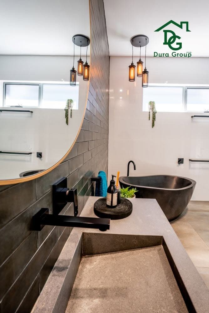Modern bathroom remodel by dura group in