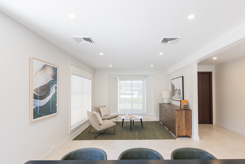 Discover the elegance and modernity in this beautifully renovated living room by Dura Group, a family-owned Sydney-based building company with 27 years of experience. Located across the Sutherland Shire, Bayside, Inner West, Georges River, and Randwick regions, Dura Group specializes in home renovations that prioritize quality, time efficiency, and transparency. This living space exemplifies our commitment to tailored building solutions with its sleek design and functional layout. Trust Dura Group with your home renovation needs. Contact us today to transform your space with our homeowner-first approach.