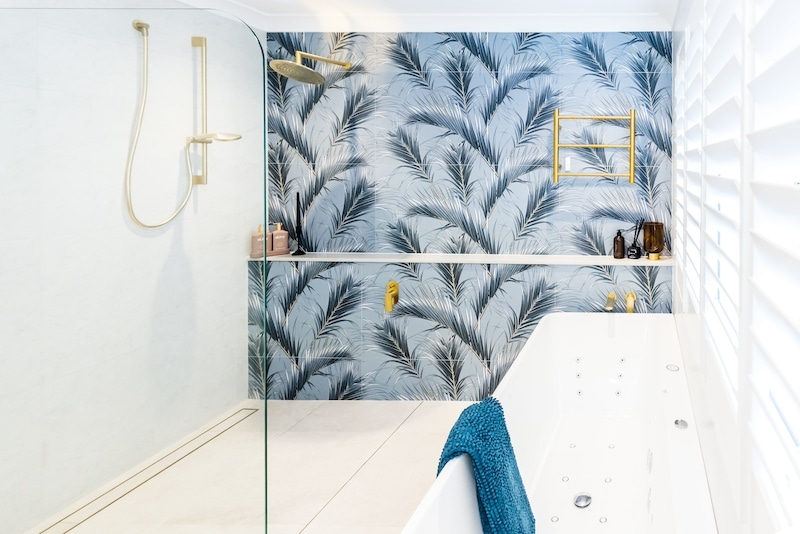 Transform your bathroom with a bold, tropical design. Elevate your space today with Dura Group's custom renovation solutions. Contact us now!